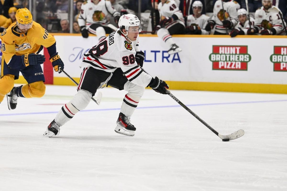 Feb 26, 2026; Nashville, Tennessee, USA;  Chicago Blackhawks center Connor Bedard (98) skates with the puck on a break away against the Nashville Predators during the second period at Bridgestone Arena. Mandatory Credit: Steve Roberts-Imagn Images