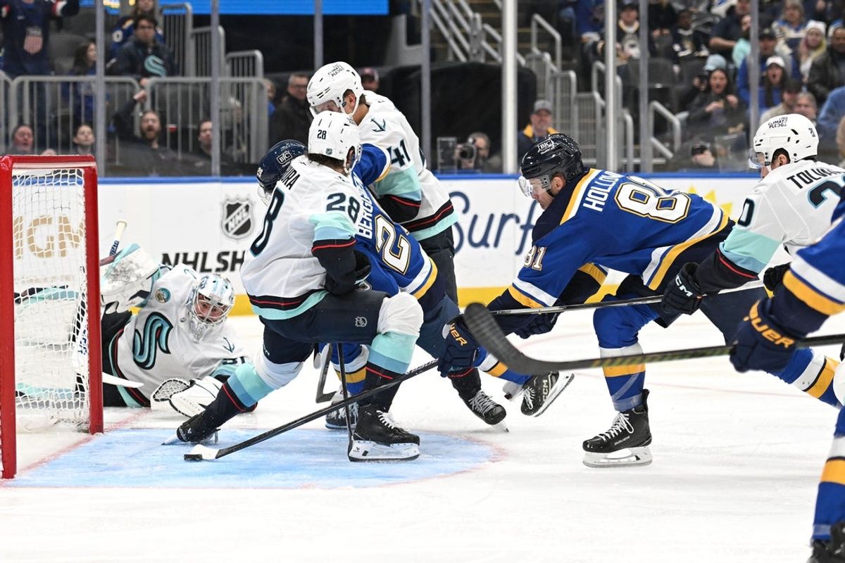 Feb 26, 2026; St. Louis, Missouri, USA; St. Louis Blues left wing Dylan Holloway (81) scores a goal against the Seattle Kraken in the second period at Enterprise Center. Mandatory Credit: Joe Puetz-Imagn Images