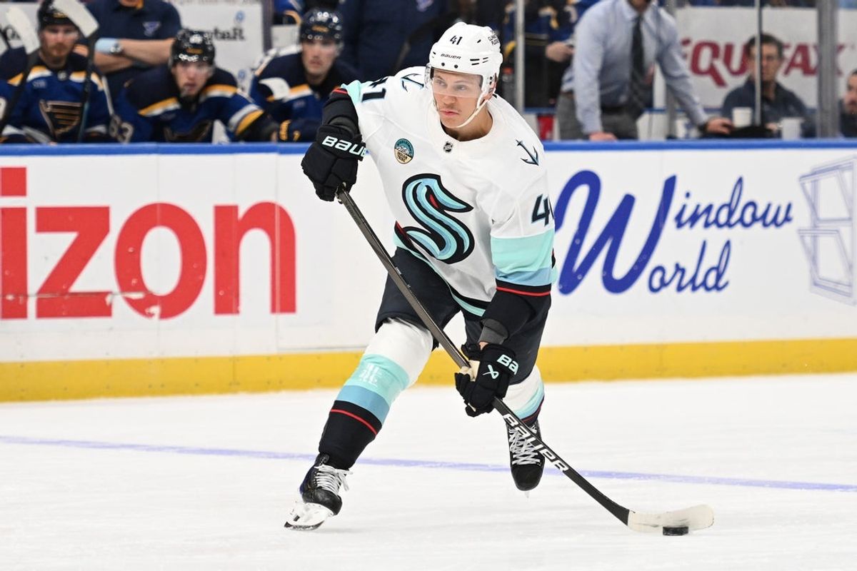 Feb 26, 2026; St. Louis, Missouri, USA; Seattle Kraken defenseman Ryker Evans (41) takes a shot against the St. Louis Blues during the third period at Enterprise Center. Mandatory Credit: Joe Puetz-Imagn Images