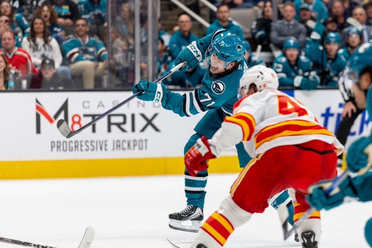 Feb 26, 2026; San Jose, California, USA; San Jose Sharks center Macklin Celebrini (71) shoots during the second period against the Calgary Flames at SAP Center at San Jose. Mandatory Credit: Bob Kupbens-Imagn Images