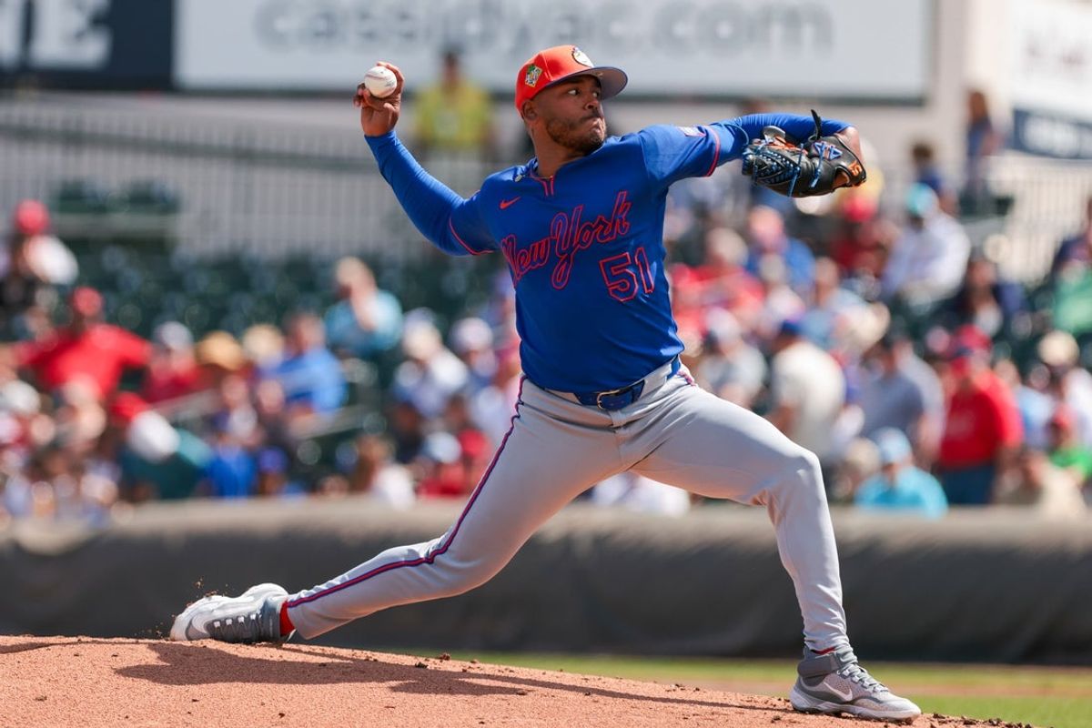 Feb 27, 2026; Jupiter, Florida, USA; New York Mets starting pitcher Freddy Peralta (51) delivers a pitch against the St. Louis Cardinals during the first inning at Roger Dean Chevrolet Stadium. Mandatory Credit: Sam Navarro-Imagn Images