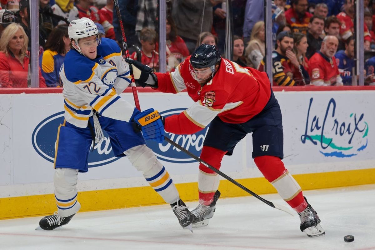 Feb 27, 2026; Sunrise, Florida, USA; Buffalo Sabres center Tage Thompson (72) shoots the puck as Florida Panthers defenseman Aaron Ekblad (5) defends during the first period at Amerant Bank Arena. Mandatory Credit: Sam Navarro-Imagn Images