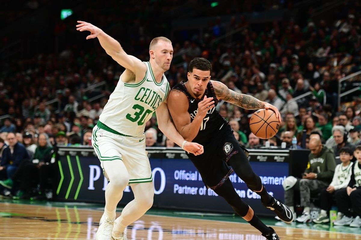 Feb 27, 2026; Boston, Massachusetts, USA; Brooklyn Nets forward Michael Porter Jr. (17) controls the ball while Boston Celtics forward Sam Hauser (30) defends during the first half at TD Garden. Mandatory Credit: Bob DeChiara-Imagn Images
