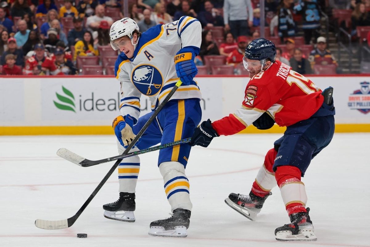 Feb 27, 2026; Sunrise, Florida, USA; Buffalo Sabres center Tage Thompson (72) moves the puck against Florida Panthers left wing Matthew Tkachuk (19) during the third period at Amerant Bank Arena. Mandatory Credit: Sam Navarro-Imagn Images