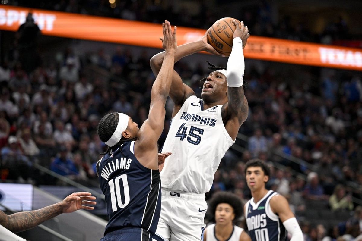 Feb 27, 2026; Dallas, Texas, USA; Memphis Grizzlies forward GG Jackson (45) shoots over Dallas Mavericks guard Brandon Williams (10) during the second half at the American Airlines Center. Mandatory Credit: Jerome Miron-Imagn Images