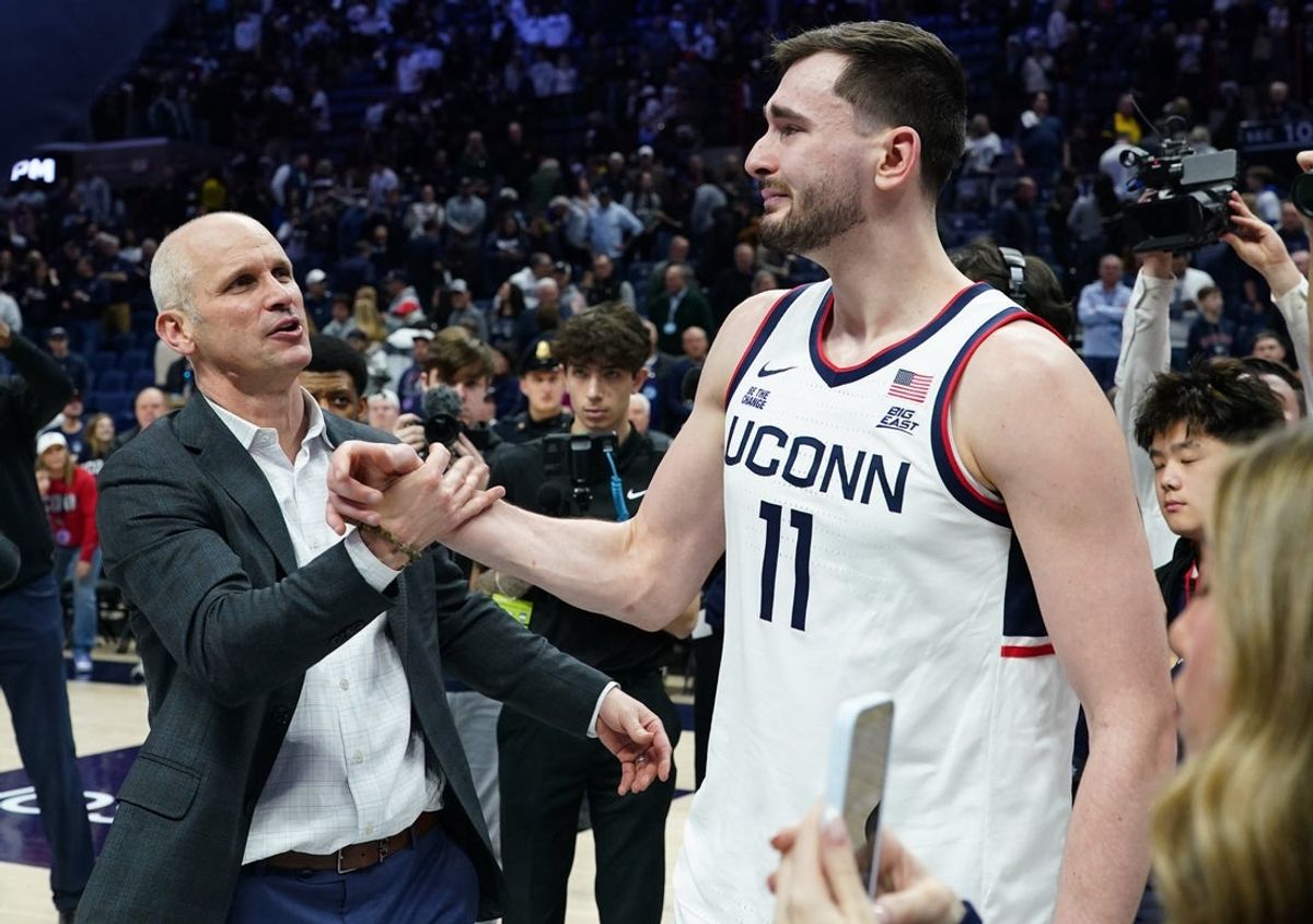 Feb 28, 2026; Storrs, Connecticut, USA; UConn Huskies forward Alex Karaban (11) has a moment on the court with head coach Dan Hurley after defeating the Seton Hall Pirates at Harry A. Gampel Pavilion. Mandatory Credit: David Butler II-Imagn Images
