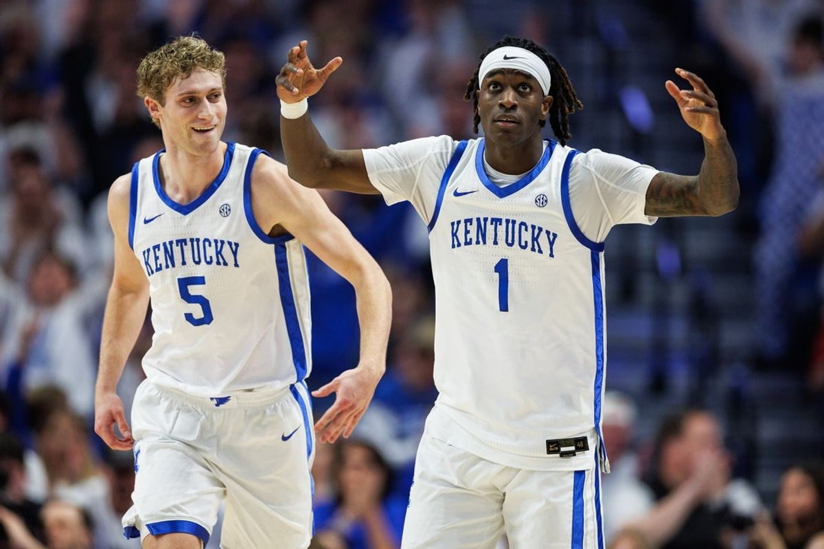 Feb 28, 2026; Lexington, Kentucky, USA; Kentucky Wildcats guard Collin Chandler (5) celebrates with guard Denzel Aberdeen (1) after Aberdeen scores a three point basket during the first half against the Vanderbilt Commodores at Rupp Arena at Central Bank Center. Mandatory Credit: Jordan Prather-Imagn Images
