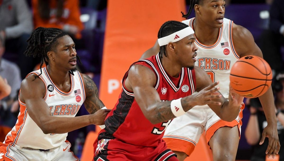 Clemson Tigers guard Jestin Porter (1) defends Louisville Cardinals guard Ryan Conwell (3) Saturday, Feb. 28, 2026, during the NCAA men’s basketball game at Littlejohn Coliseum in Clemson, South Carolina.