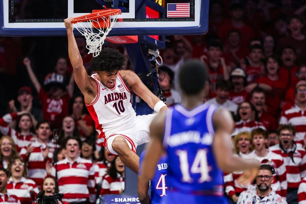 Feb 28, 2026; Tucson, Arizona, USA; Arizona Wildcats forward Koa Peat (10) dunks the ball during the first half of the game against the Kansas Jayhawks at McKale Memorial Center. Mandatory Credit: Aryanna Frank-Imagn Images