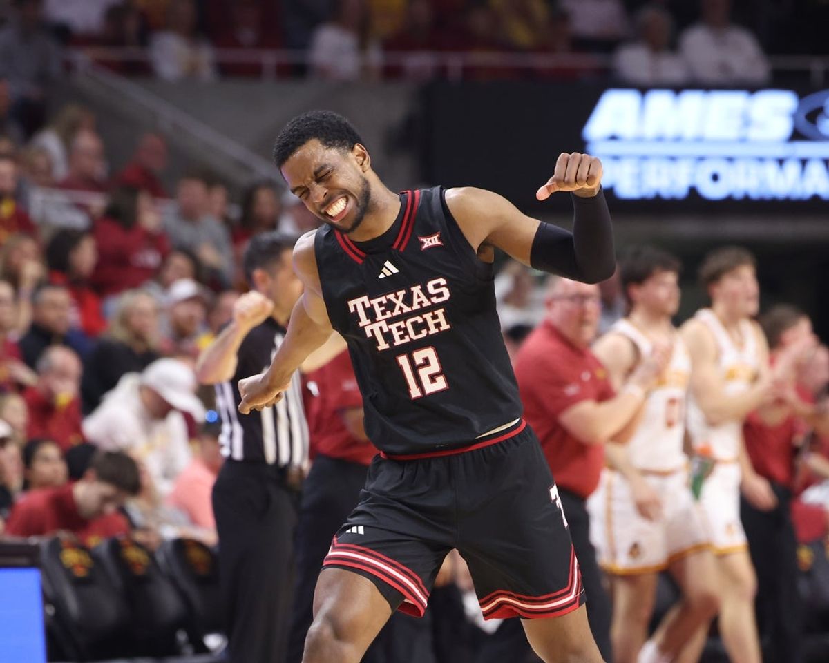 Feb 28, 2026; Ames, Iowa, USA; Texas Tech Red Raiders forward Donovan Atwell (12) celebrates during the first half against the Iowa State Cyclones at James H. Hilton Coliseum. Mandatory Credit: Reese Strickland-Imagn Images