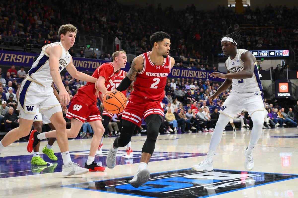 Feb 28, 2026; Seattle, Washington, USA; Wisconsin Badgers guard Nick Boyd (2) dribbles the ball during the second half against the Washington Huskies at Alaska Airlines Arena at Hec Edmundson Pavilion. Mandatory Credit: Steven Bisig-Imagn Images