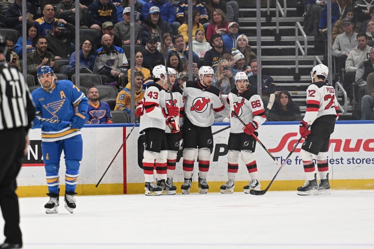 Feb 28, 2026; St. Louis, Missouri, USA; New Jersey Devils right wing Timo Meier (28) is congratulated after scoring a goal against the St. Louis Blues in the second period at Enterprise Center. Mandatory Credit: Joe Puetz-Imagn Images