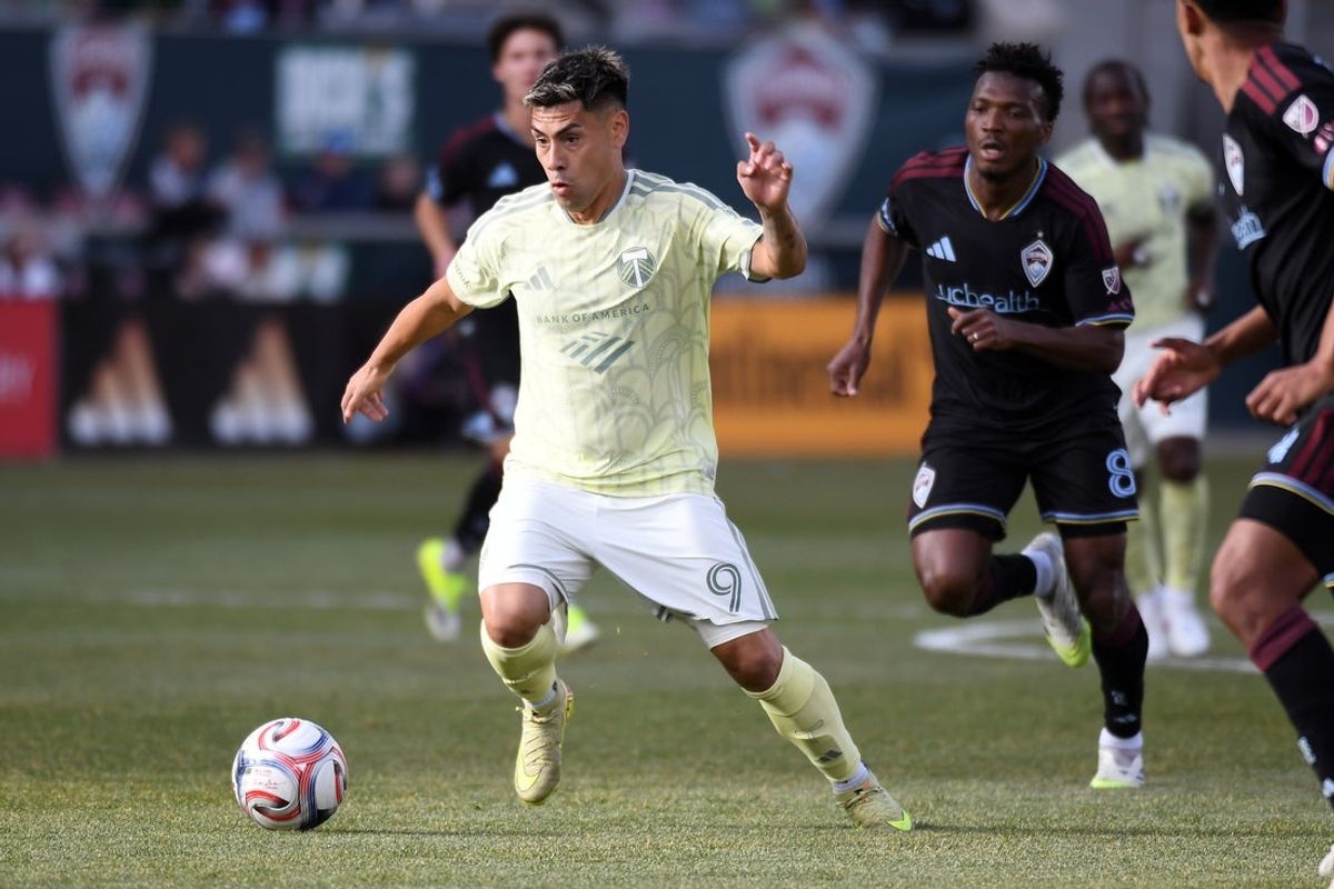 Feb 28, 2026; Commerce City, Colorado, USA; Portland Timbers forward Felipe Mora (9) takes the ball into the offensive zone during the second half against the Colorado Rapids at Dick's Sporting Goods Park. Mandatory Credit: Christopher Hanewinckel-Imagn Images
