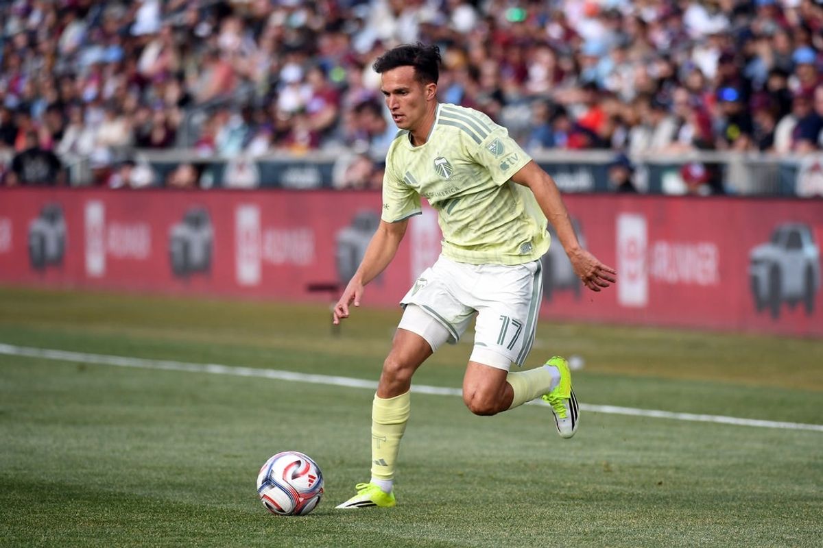 Feb 28, 2026; Commerce City, Colorado, USA; Portland Timbers midfielder Cole Bassett (17) handles the ball during the second half against the Colorado Rapids at Dick's Sporting Goods Park. Mandatory Credit: Christopher Hanewinckel-Imagn Images