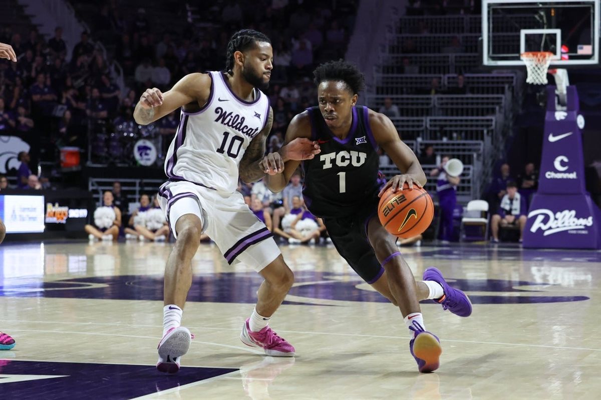 Feb 28, 2026; Manhattan, Kansas, USA; TCU Horned Frogs guard Jayden Pierre (1) is guarded by Kansas State Wildcats guard David Castillo (10) during the first half at Bramlage Coliseum. Mandatory Credit: Scott Sewell-Imagn Images