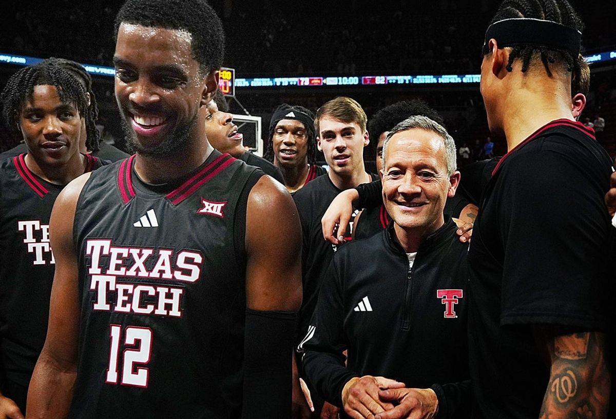 Texas Tech Red Raiders men's basketball head coach Grant McCasland celebrates with team after winning 82073 over Iowa State in the Big-12 conference men’s basketball showdown on Feb. 28, 2026, at Hilton Coliseum in Ames, Iowa.