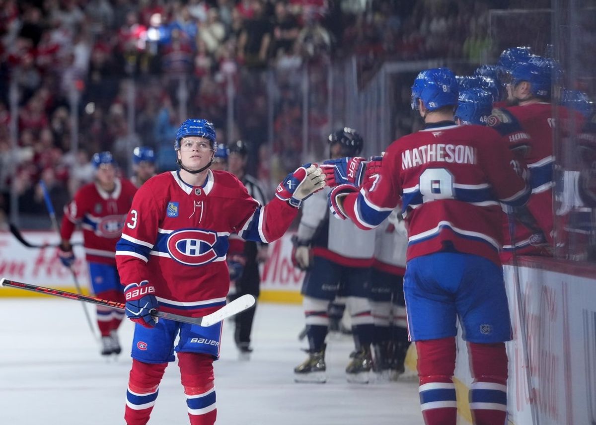 Feb 28, 2026; Montreal, Quebec, CAN; Montreal Canadiens forward Cole Caufield (13) celebrates with teammates after scoring a goal against the Washington Capitals during the first period at the Bell Centre. Mandatory Credit: Eric Bolte-Imagn Images