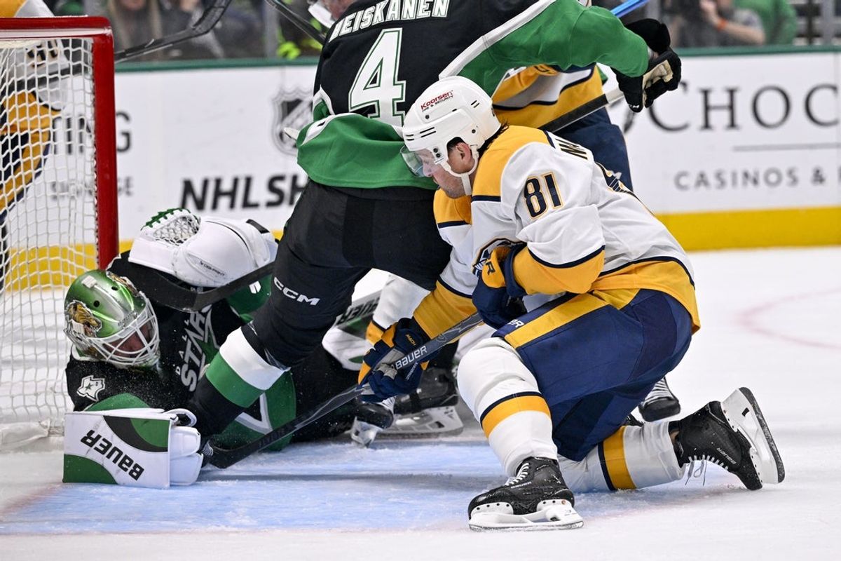 Feb 28, 2026; Dallas, Texas, USA; Dallas Stars goaltender Jake Oettinger (29) stops a shot by Nashville Predators right wing Jonathan Marchessault (81) during the first period at the American Airlines Center. Mandatory Credit: Jerome Miron-Imagn Images