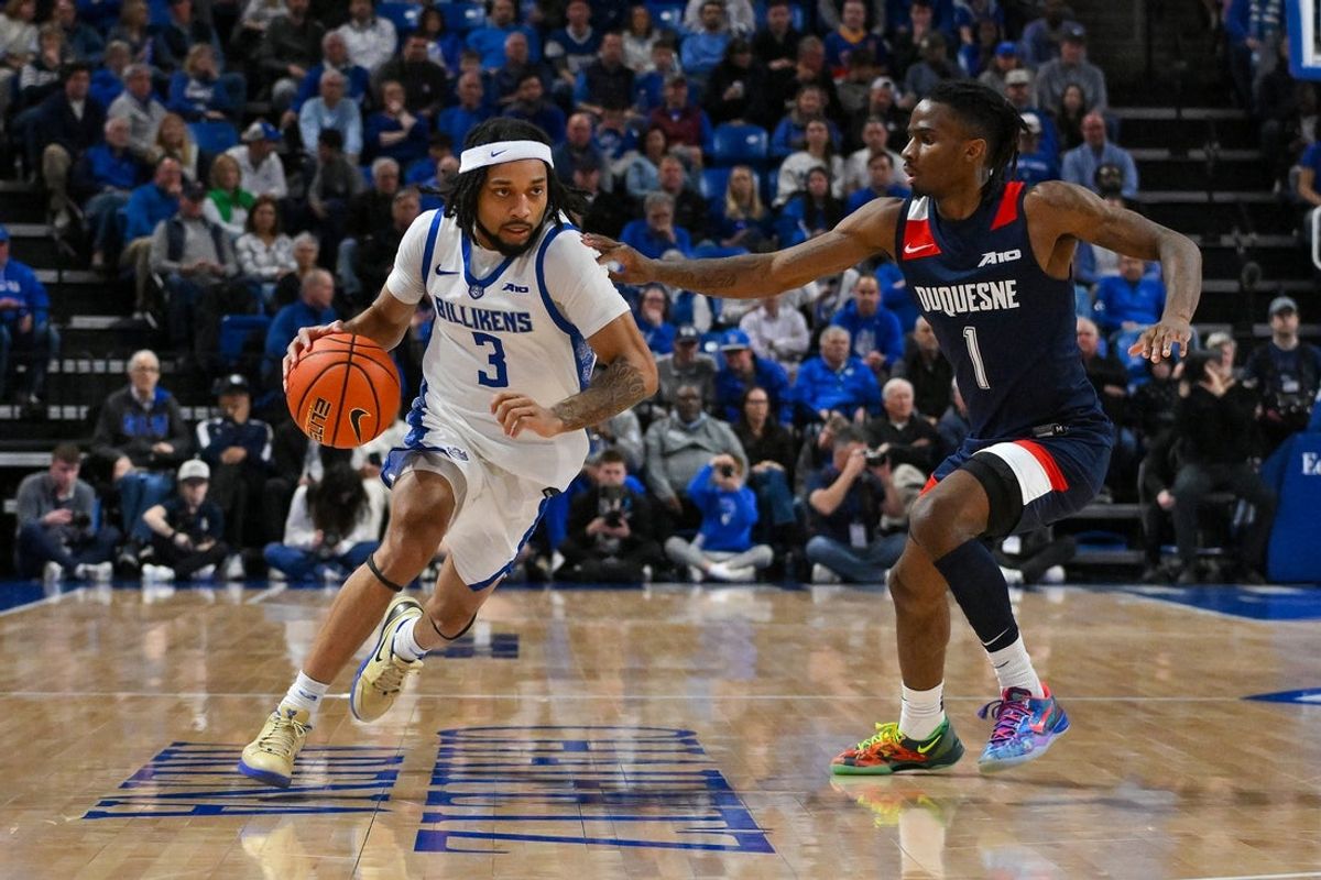 Feb 28, 2026; St. Louis, Missouri, USA; Saint Louis Billikens guard Trey Green (3) drives to the basket as Duquesne Dukes guard Tarence Guinyard (1) defends during the first half at Chaifetz Arena. Mandatory Credit: Jeff Curry-Imagn Images