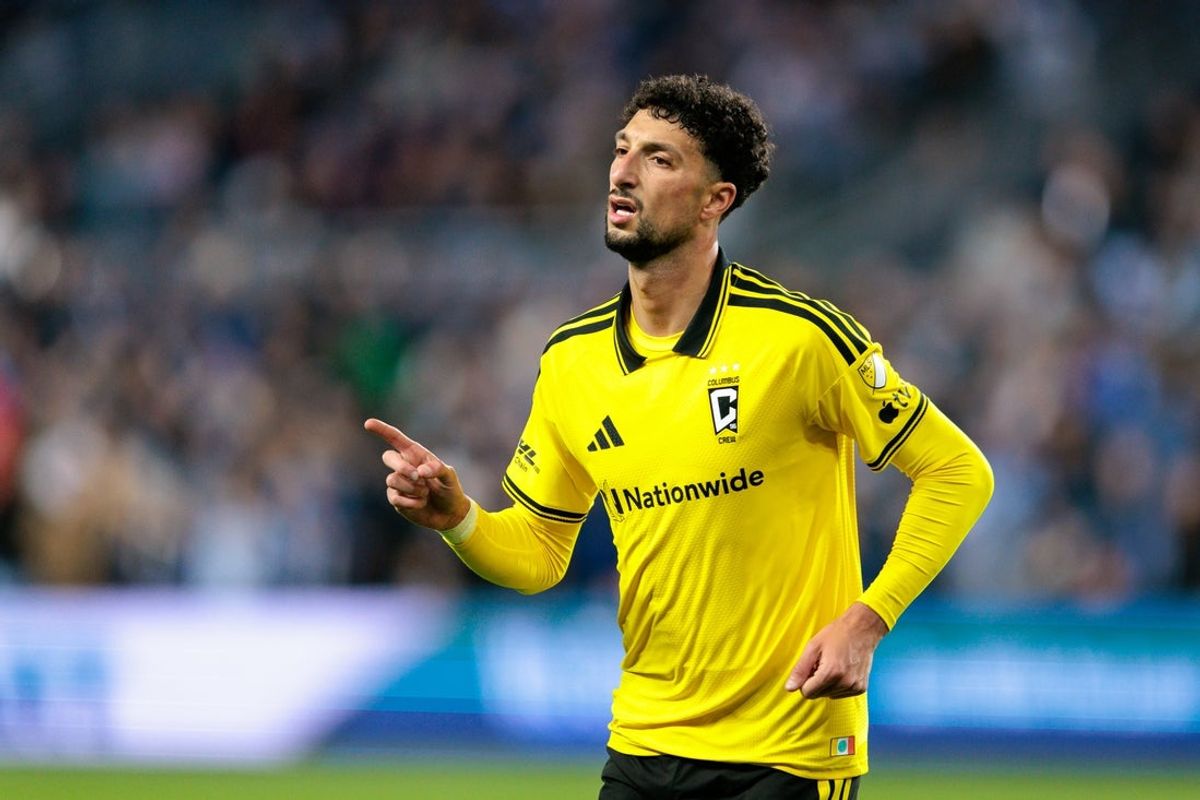 Feb 28, 2026; Kansas City, Kansas, USA; Columbus Crew forward Wessam Abou Ali (9) reacts after scoring a goal during the first half against the Sporting Kansas City at Children's Mercy Park. Mandatory Credit: William Purnell-Imagn Images