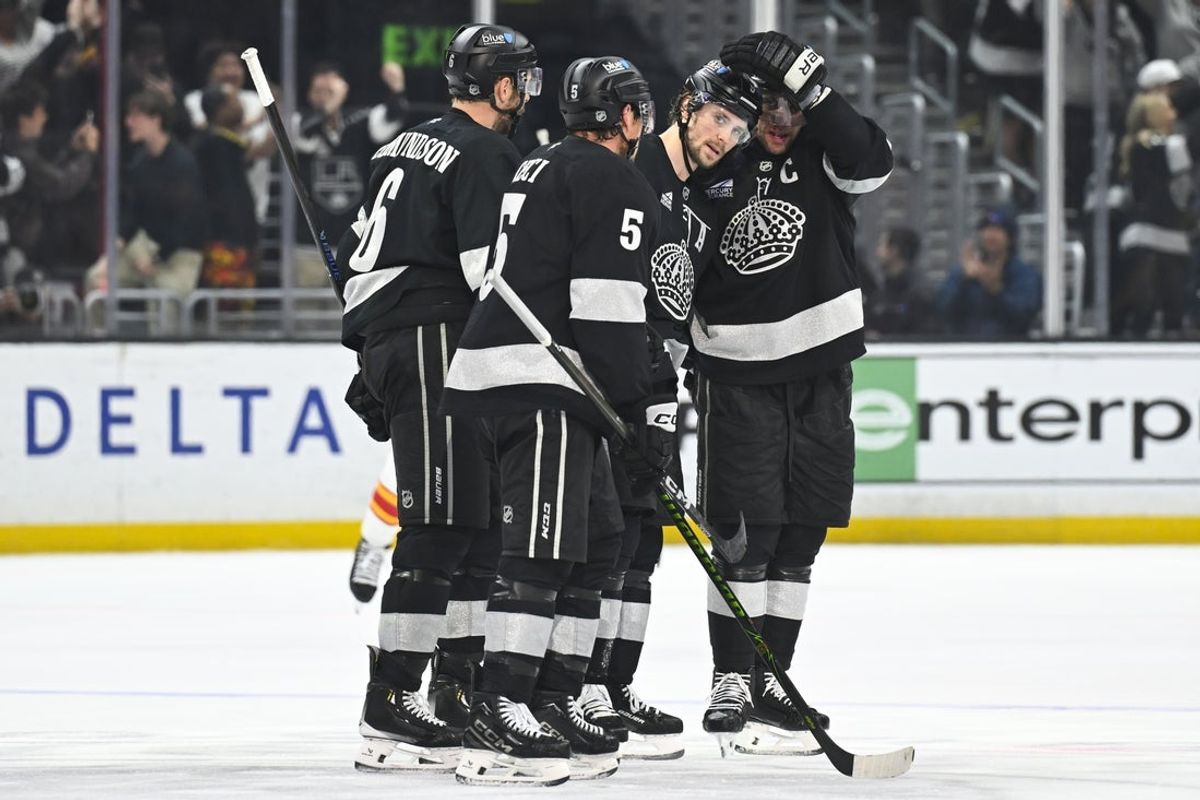 Feb 28, 2026; Los Angeles, California, USA; Los Angeles Kings celebrate after the goal scored by Los Angeles Kings right wing Adrian Kempe (9) during the third period against the Calgary Flames at Crypto.com Arena. Mandatory Credit: Griffin Hooper-Imagn Images