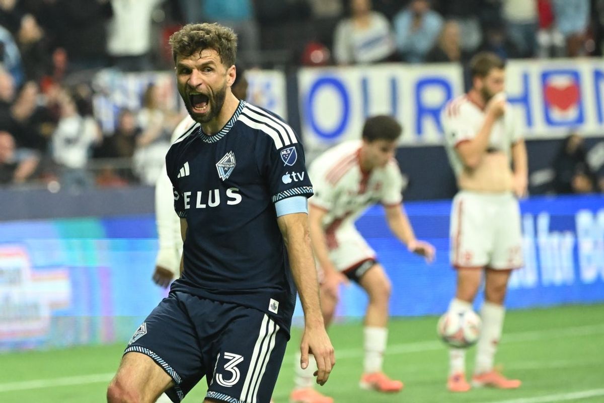 Feb 28, 2026; Vancouver, British Columbia, CAN;  Vancouver Whitecaps FC forward Thomas Muller (13) celebrates scoring on a corner kick from midfielder Sebastian Berhalter (16) (not pictured) against Toronto FC goalkeeper Luka Gavran (1) during the first half at BC Place. Mandatory Credit: Simon Fearn-Imagn Images
