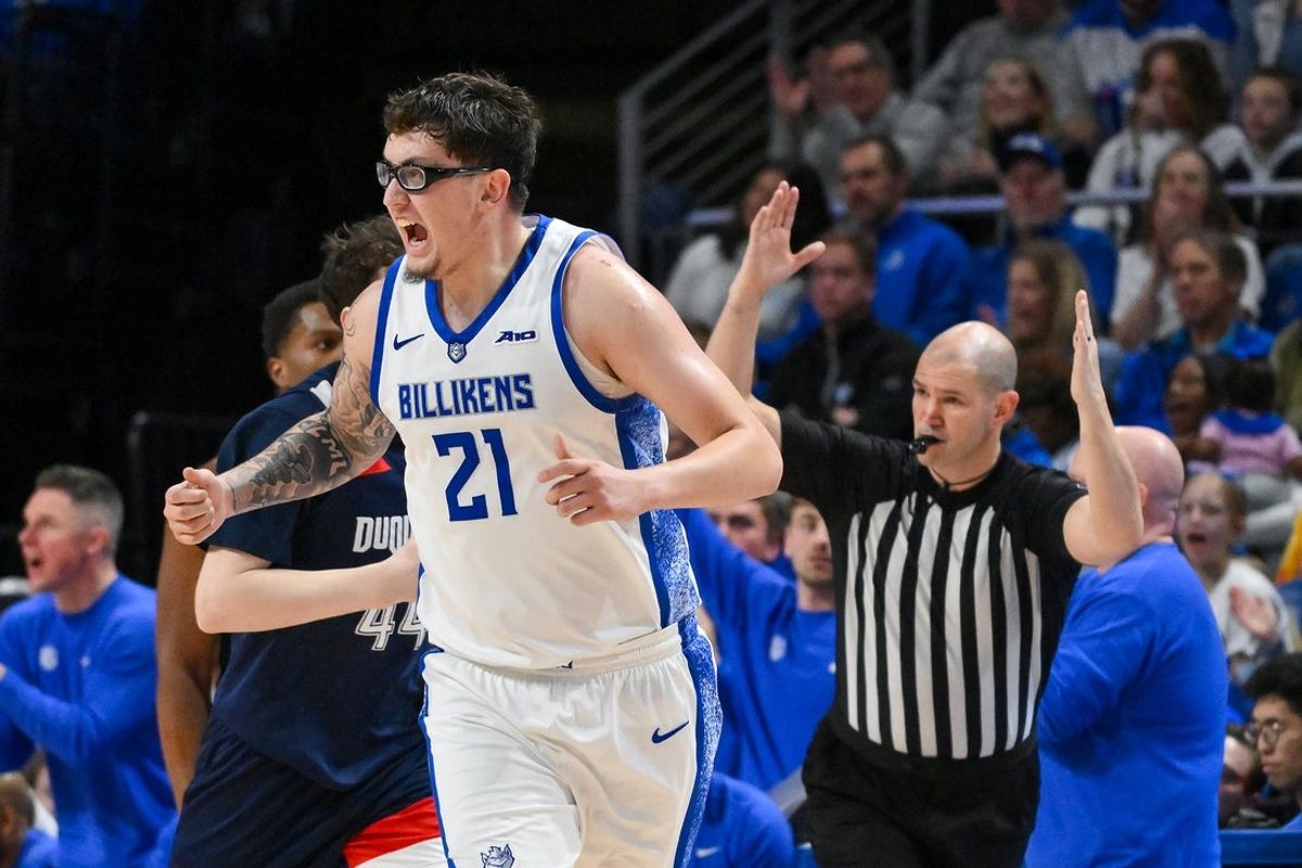 Feb 28, 2026; St. Louis, Missouri, USA; Saint Louis Billikens center Robbie Avila (21) reacts after making a three point shot against the Duquesne Dukes during the second half at Chaifetz Arena. Mandatory Credit: Jeff Curry-Imagn Images