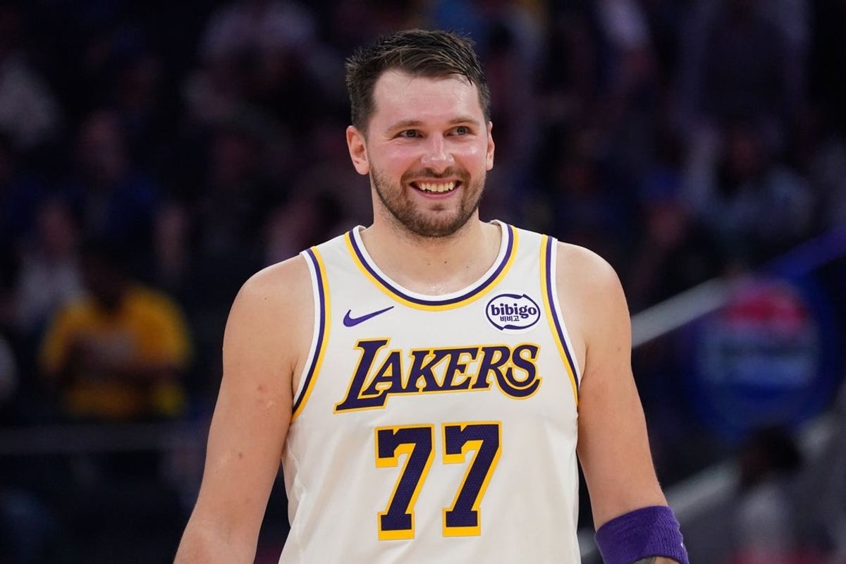 Feb 28, 2026; San Francisco, California, USA;  Los Angeles Lakers forward/guard Luka Doncic (77) smiles during a break in the action against the Golden State Warriors in the third period at Chase Center. Mandatory Credit: David Gonzales-Imagn Images