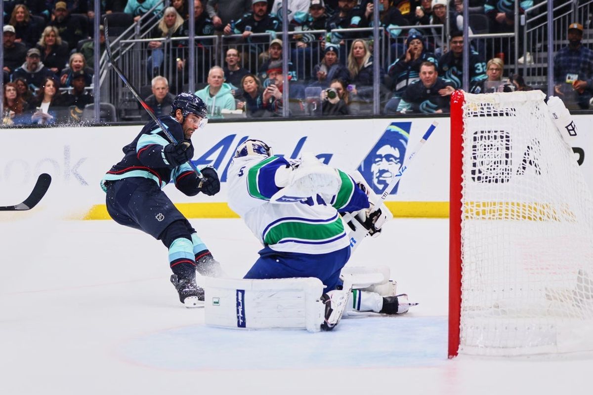 Feb 28, 2026; Seattle, Washington, USA; Seattle Kraken right wing Jordan Eberle (7) scores a goal past Vancouver Canucks goaltender Kevin Lankinen (32) during the second period at Climate Pledge Arena. Mandatory Credit: Blake Dahlin-Imagn Images