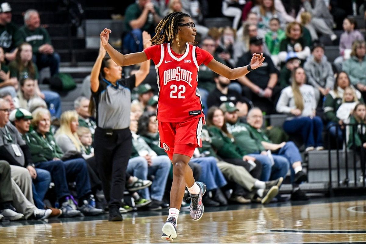 Ohio State's Jaloni Cambridge celebrates after a 3-pointer against Michigan State during the second quarter on Sunday, March 1, 2026, at the Breslin Center in East Lansing.
