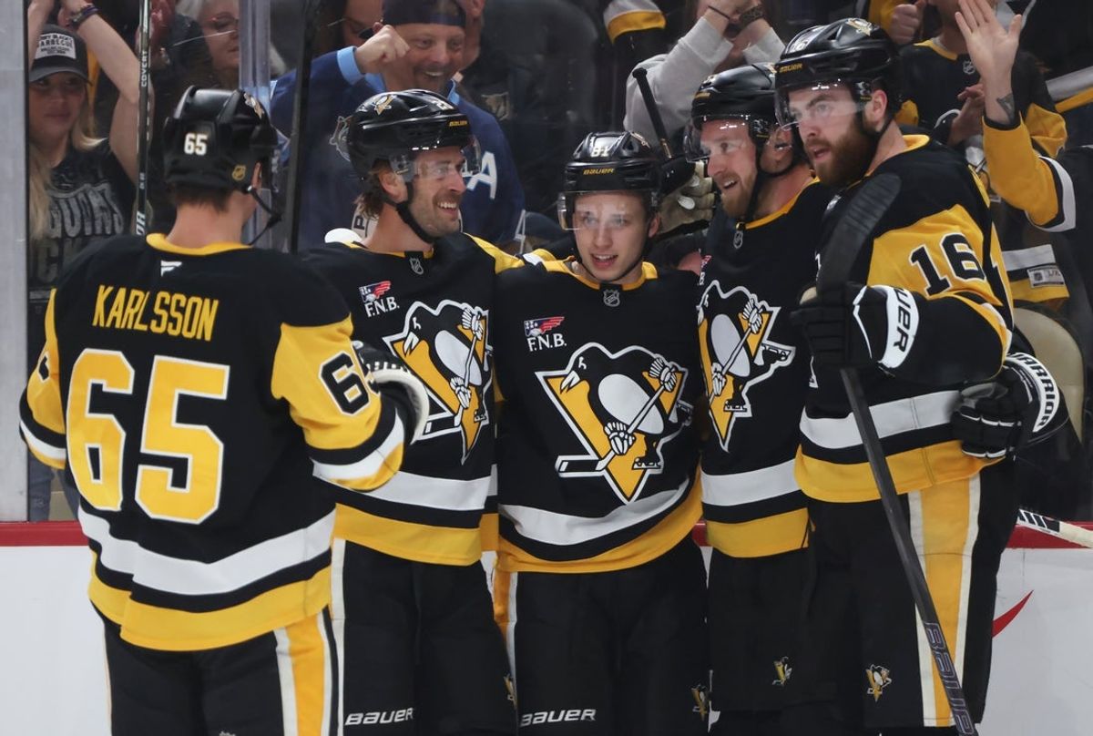 Mar 1, 2026; Pittsburgh, Pennsylvania, USA;  Pittsburgh Penguins teammates congratulate center Ben Kindel (middle) on his goal against the Vegas Golden Knights during the first period at PPG Paints Arena. Mandatory Credit: Charles LeClaire-Imagn Images