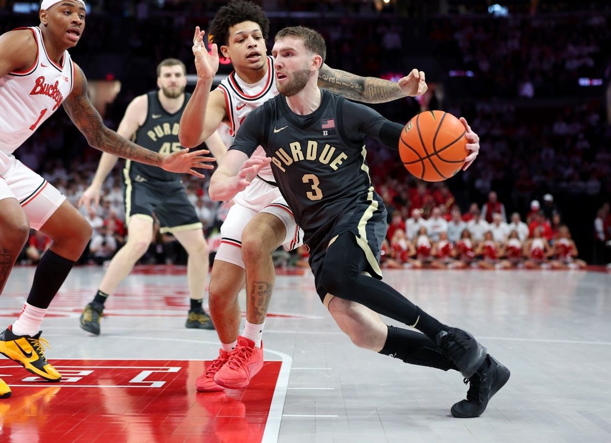 Mar 1, 2026; Columbus, Ohio, USA;  Purdue Boilermakers guard Braden Smith (3) drives to the basket as Ohio State Buckeyes guard John Mobley Jr. (0) defends during the first half at Value City Arena. Mandatory Credit: Joseph Maiorana-Imagn Images