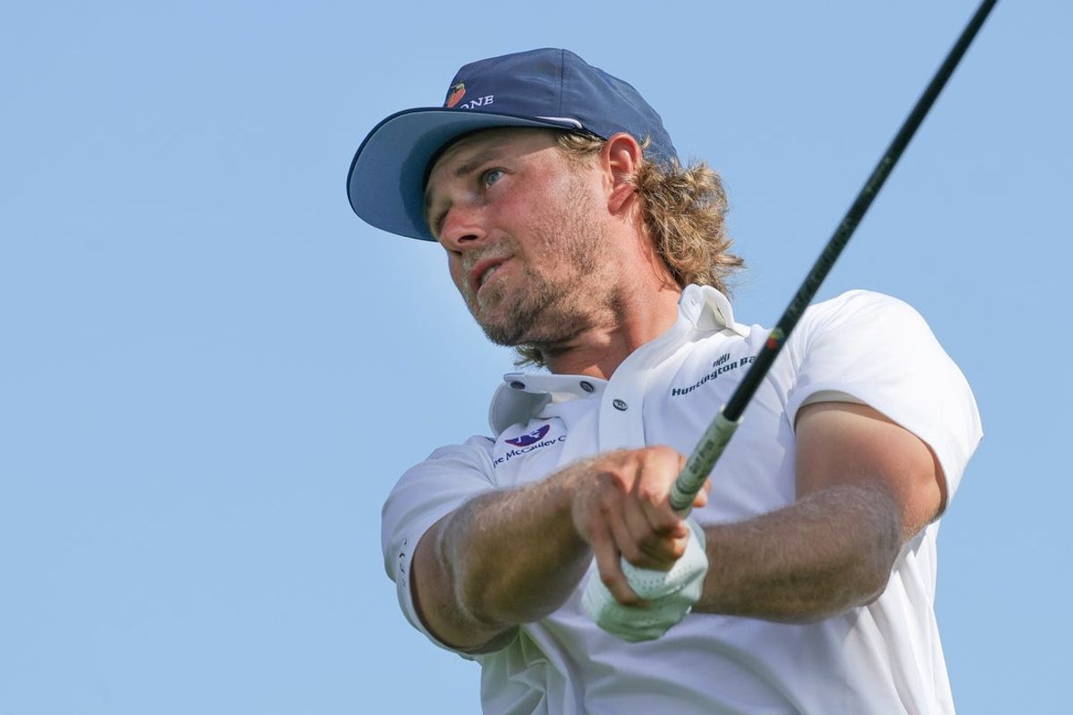 Mar 1, 2026; Palm Beach Gardens, Florida, USA; Austin Smotherman plays his shot from the first tee during the final round of the Cognizant Classic golf tournament. Mandatory Credit: Reinhold Matay-Imagn Images