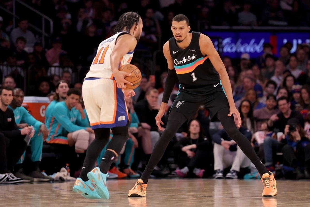 Mar 1, 2026; New York; Spurs forward Victor Wembanyama (1) defends Knicks guard Jalen Brunson (11) during the third quarter at Madison Square Garden. Credit: Brad Penner-Imagn Images