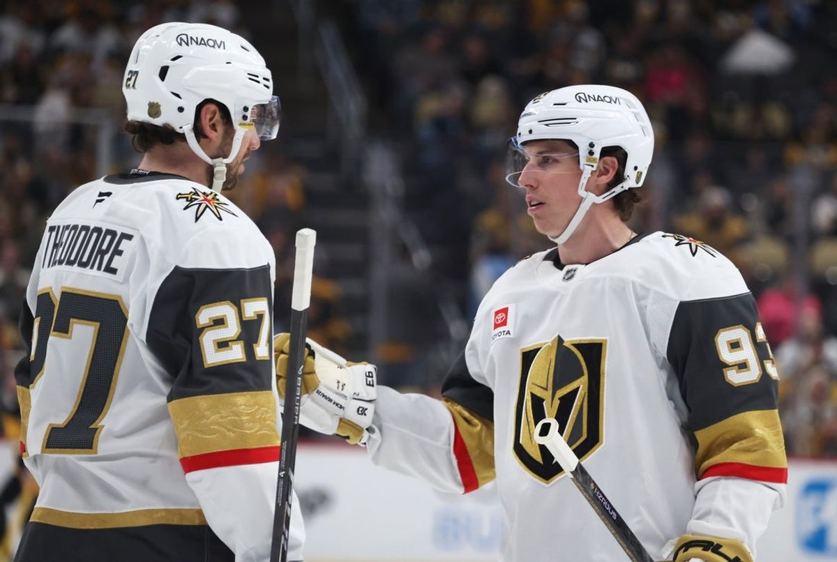 Mar 1, 2026; Pittsburgh, Pennsylvania, USA;  Vegas Golden Knights defenseman Shea Theodore (27) and right wing Mitch Marner (93) talk on the ice against the Pittsburgh Penguins during the third period at PPG Paints Arena. Mandatory Credit: Charles LeClaire-Imagn Images