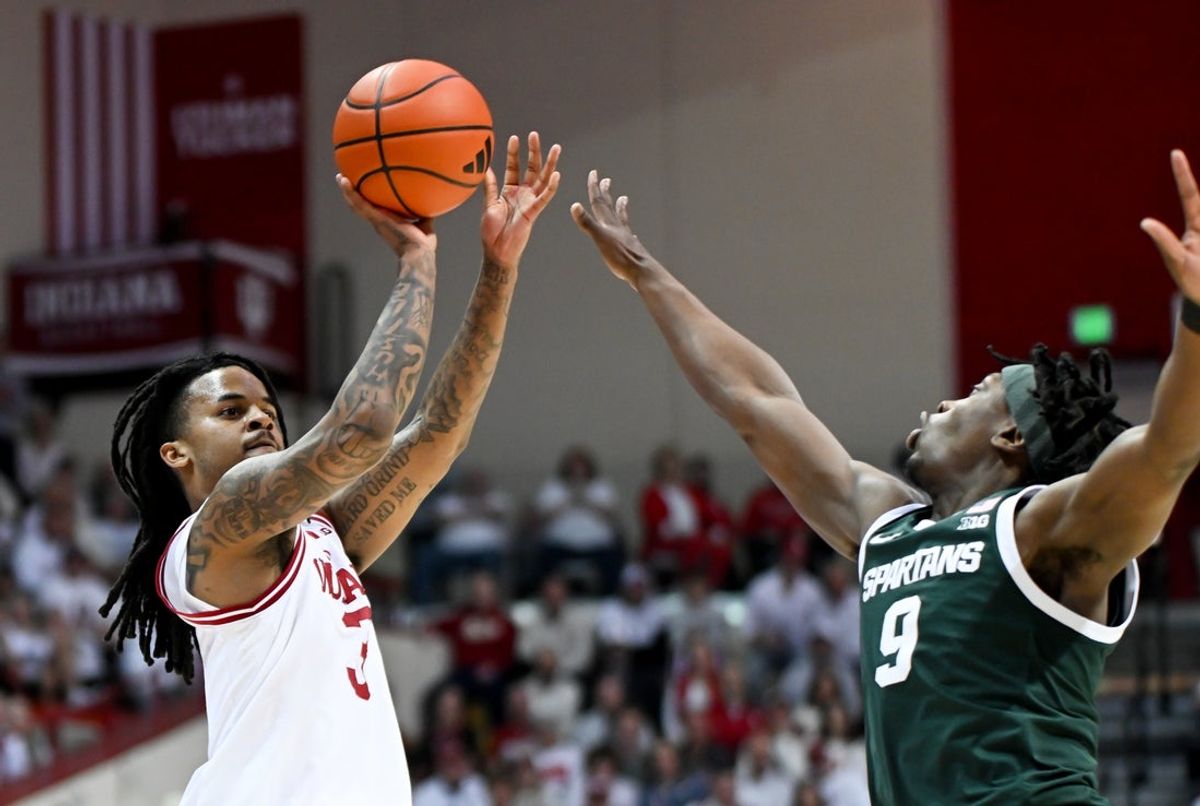Mar 1, 2026; Bloomington, Indiana, USA; Indiana Hoosiers guard Lamar Wilkerson (3) shoots over Michigan State Spartans guard Trey Fort (9) during the first half at Simon Skjodt Assembly Hall. Mandatory Credit: Robert Goddin-Imagn Images