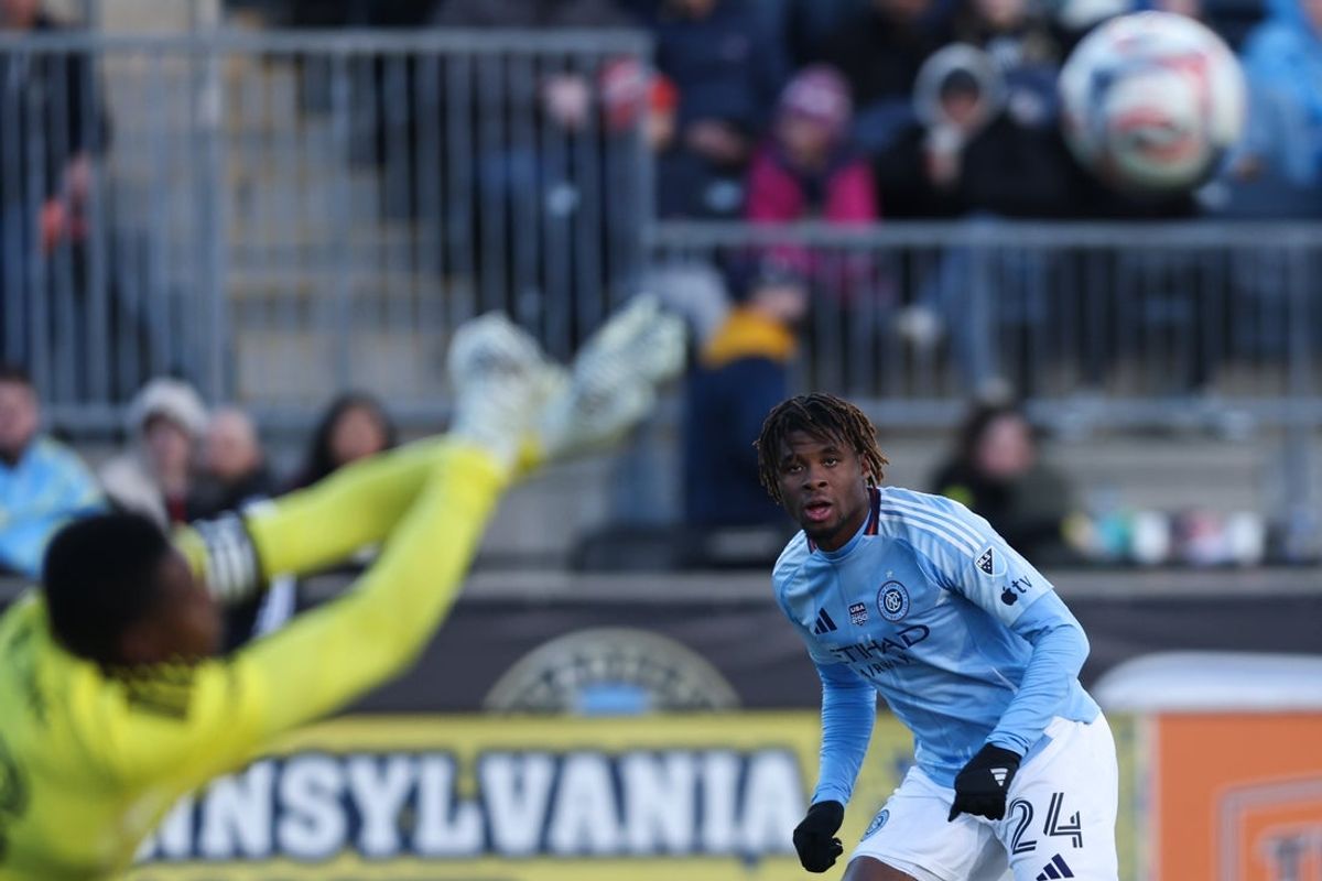 Mar 1, 2026; Chester, Pennsylvania, USA; New York City FC defender Tayvon Gray (24) shoots on Philadelphia Union goalkeeper Andre Blake (18) during the first half at Subaru Park. Mandatory Credit: Bill Streicher-Imagn Images