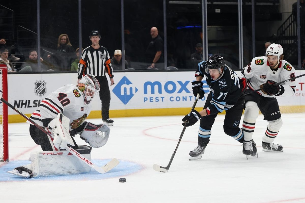 Mar 1, 2026; Salt Lake City, Utah, USA; Utah Mammoth right wing JJ Peterka (77) shoots wide of Chicago Blackhawks goaltender Arvid Soderblom (40) during the second period at Delta Center. Mandatory Credit: Rob Gray-Imagn Images