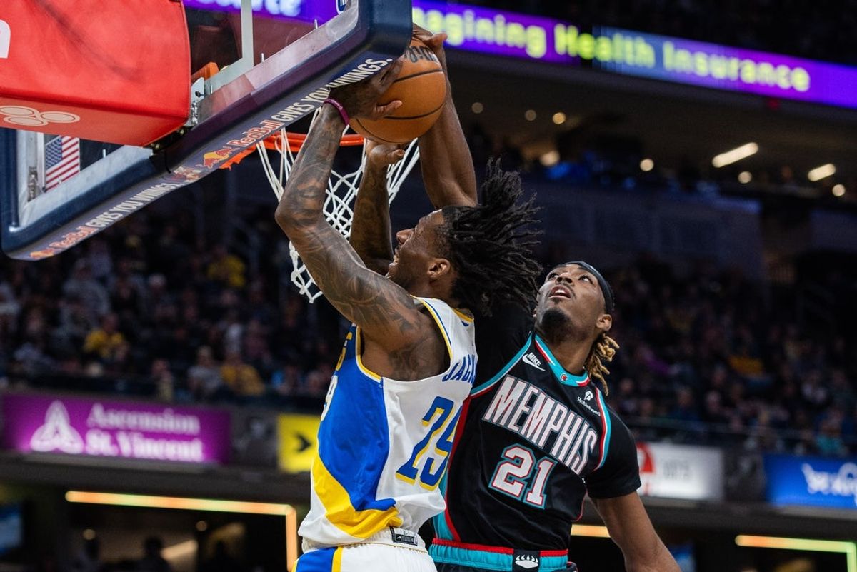 Mar 1, 2026; Indianapolis, Indiana, USA; Indiana Pacers guard Quenton Jackson (29) shoots the ball while Memphis Grizzlies guard Jahmai Mashack (21) defends in the first half at Gainbridge Fieldhouse. Mandatory Credit: Trevor Ruszkowski-Imagn Images