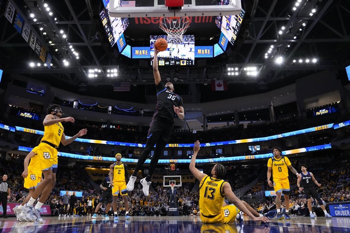 Mar 1, 2026; Milwaukee, Wisconsin, USA;  DePaul Blue Demons forward NJ Benson (35) shoots during the second half against the Marquette Golden Eagles at Fiserv Forum. Mandatory Credit: Jeff Hanisch-Imagn Images