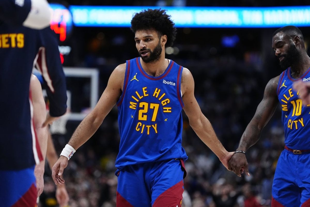 Mar 1, 2026; Denver, Colorado, USA; Denver Nuggets guard Jamal Murray (27) during a time out in the second half against the Minnesota Timberwolves at Ball Arena. Mandatory Credit: Ron Chenoy-Imagn Images