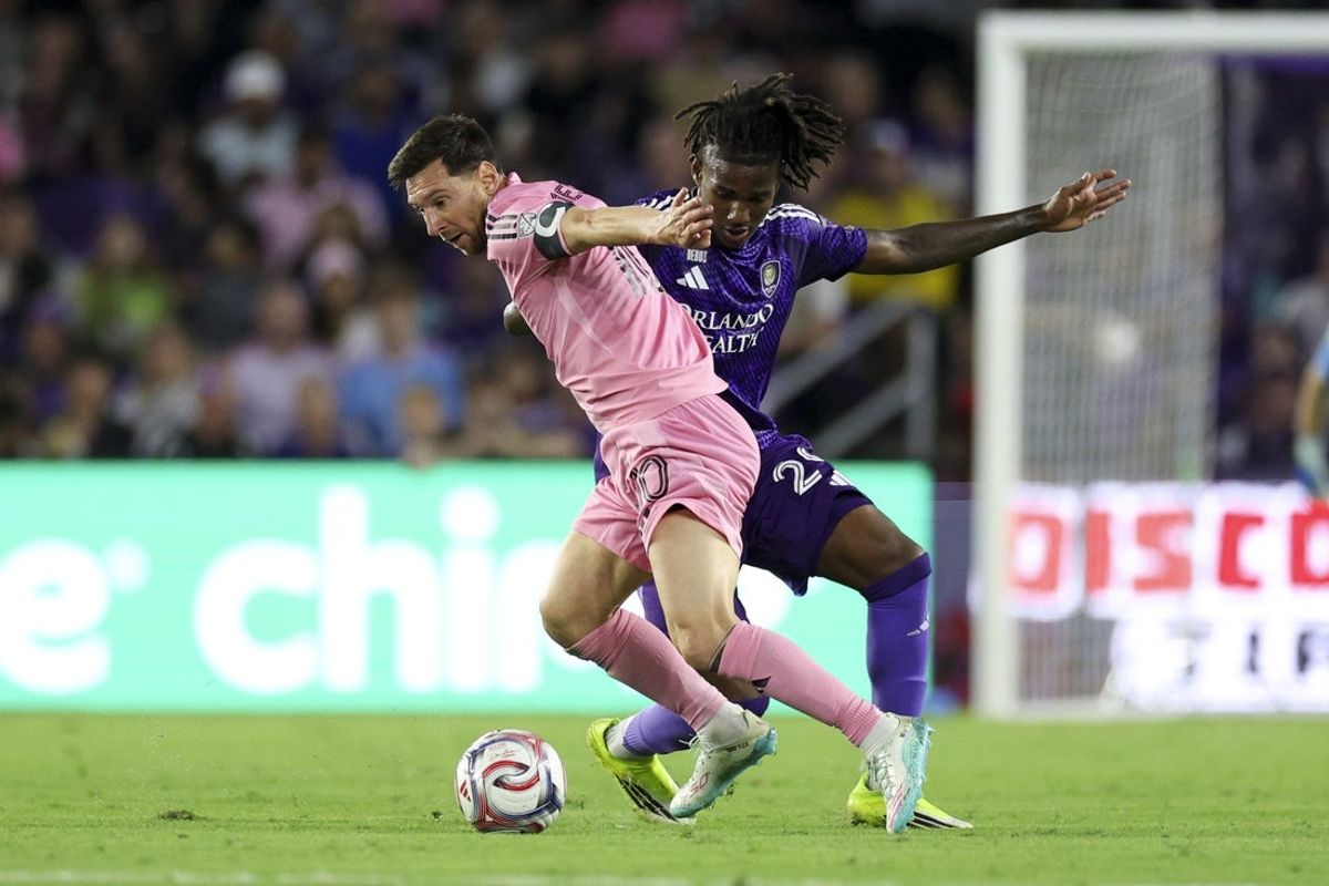 Mar 1, 2026; Orlando, Florida, USA; Inter Miami CF forward Lionel Messi (10) controls the ball from Orlando City SC defender Tahir Reid-Brown (29) in the first half at Inter&Co Stadium. Mandatory Credit: Nathan Ray Seebeck-Imagn Images
