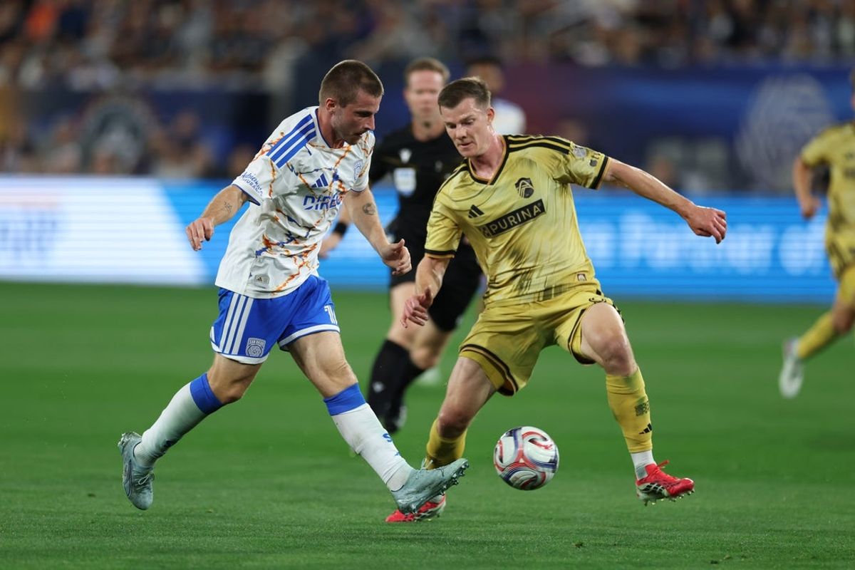 Mar 1, 2026; San Diego, California, USA; San Diego FC midfielder Anders Dreyer (10) kicks the ball against St. Louis CITY SC midfielder Christopher Durkin (8) during the first half at Snapdragon Stadium. Mandatory Credit: Abe Arredondo-Imagn Images