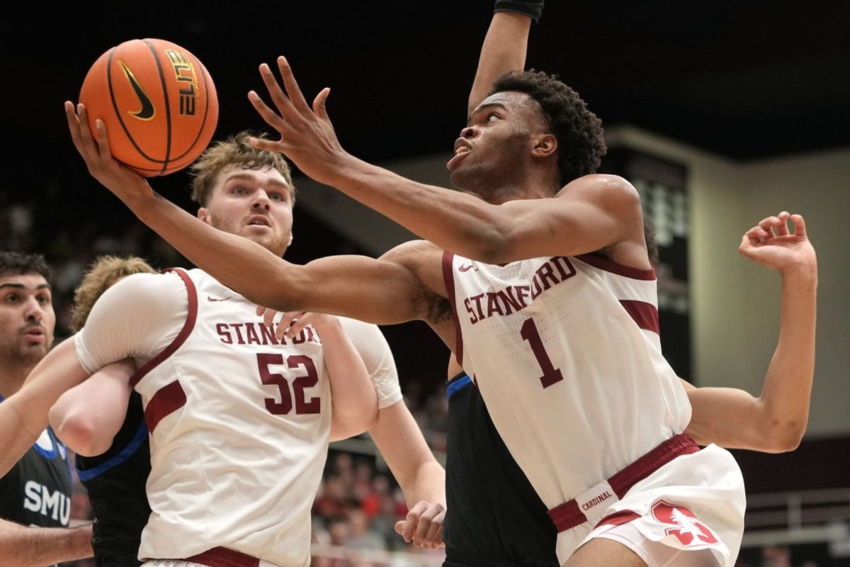 Feb 28, 2026; Stanford, California, USA; Stanford Cardinal guard Ebuka Okorie (1) shoots against the Southern Methodist University Mustangs during the first half at Maples Pavilion. Mandatory Credit: Darren Yamashita-Imagn Images
