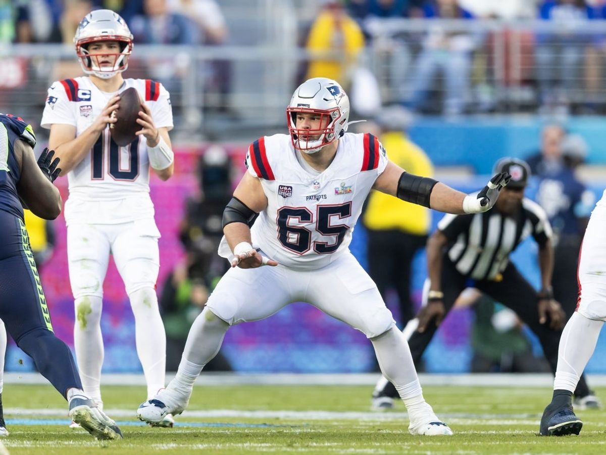Feb 8, 2026; Santa Clara, CA, USA; New England Patriots center Garrett Bradbury (65) blocks for quarterback Drake Maye (10) against the Seattle Seahawks during Super Bowl LX at Levi's Stadium. Mandatory Credit: Mark J. Rebilas-Imagn Images