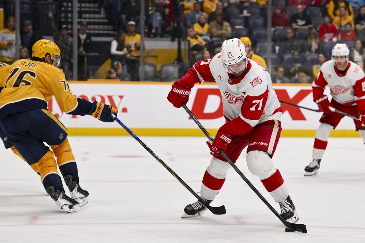 Mar 2, 2026; Nashville, Tennessee, USA;  Detroit Red Wings center Dylan Larkin (71) skates with the puck against the Nashville Predators during the third period at Bridgestone Arena. Mandatory Credit: Steve Roberts-Imagn Images