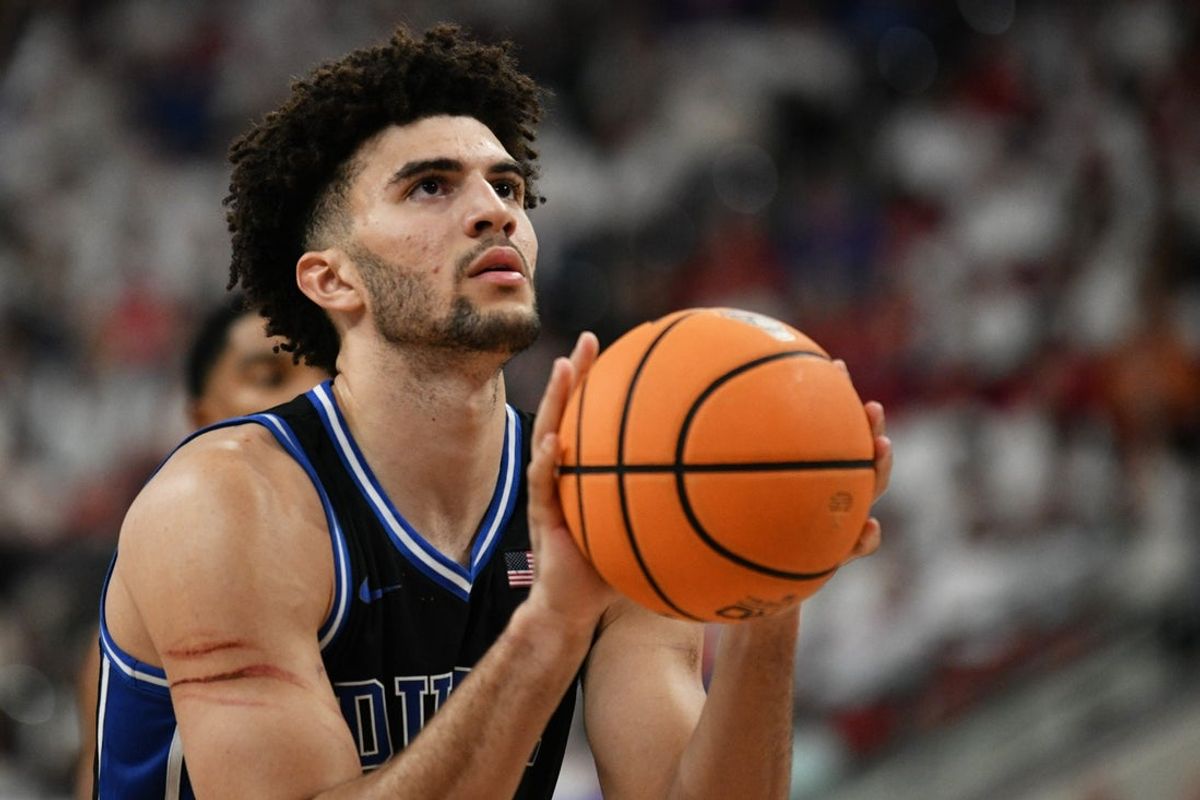 Mar 2, 2026; Raleigh, North Carolina, USA;  Duke Blue Devils forward Cameron Boozer (12) shoots a free throw during the second half against the NC State Wolfpack at Lenovo Center. Mandatory Credit: Zachary Taft-Imagn Images