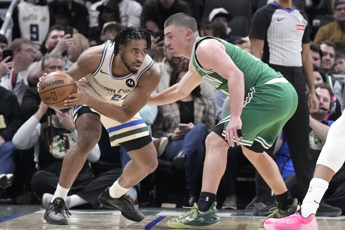 Mar 2, 2026; Milwaukee, Wisconsin, USA; Milwaukee Bucks guard Cam Thomas (24) and Boston Celtics guard Payton Pritchard (11) square off in the second half at Fiserv Forum. Mandatory Credit: Michael McLoone-Imagn Images