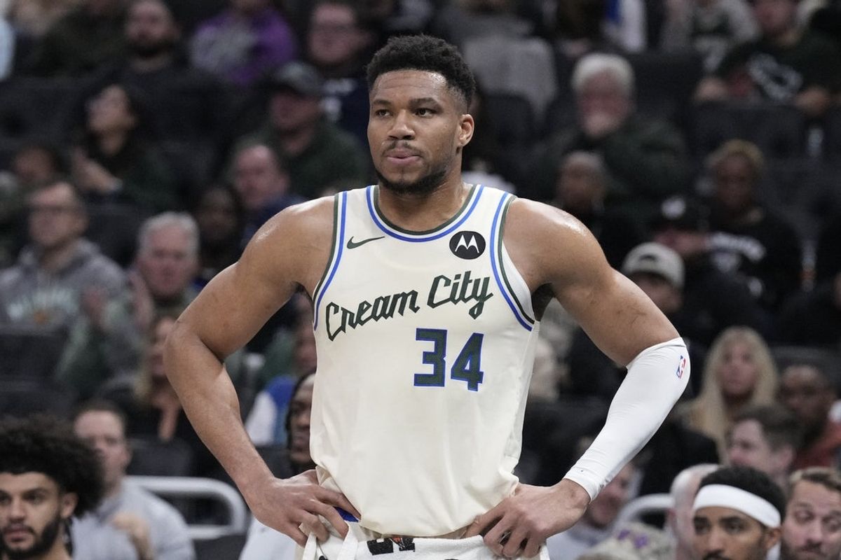 Mar 2, 2026; Milwaukee, Wisconsin, USA; Milwaukee Bucks forward Giannis Antetokounmpo (34) watches the end of the second quarter from the bench against the Boston Celtics at Fiserv Forum. Mandatory Credit: Michael McLoone-Imagn Images