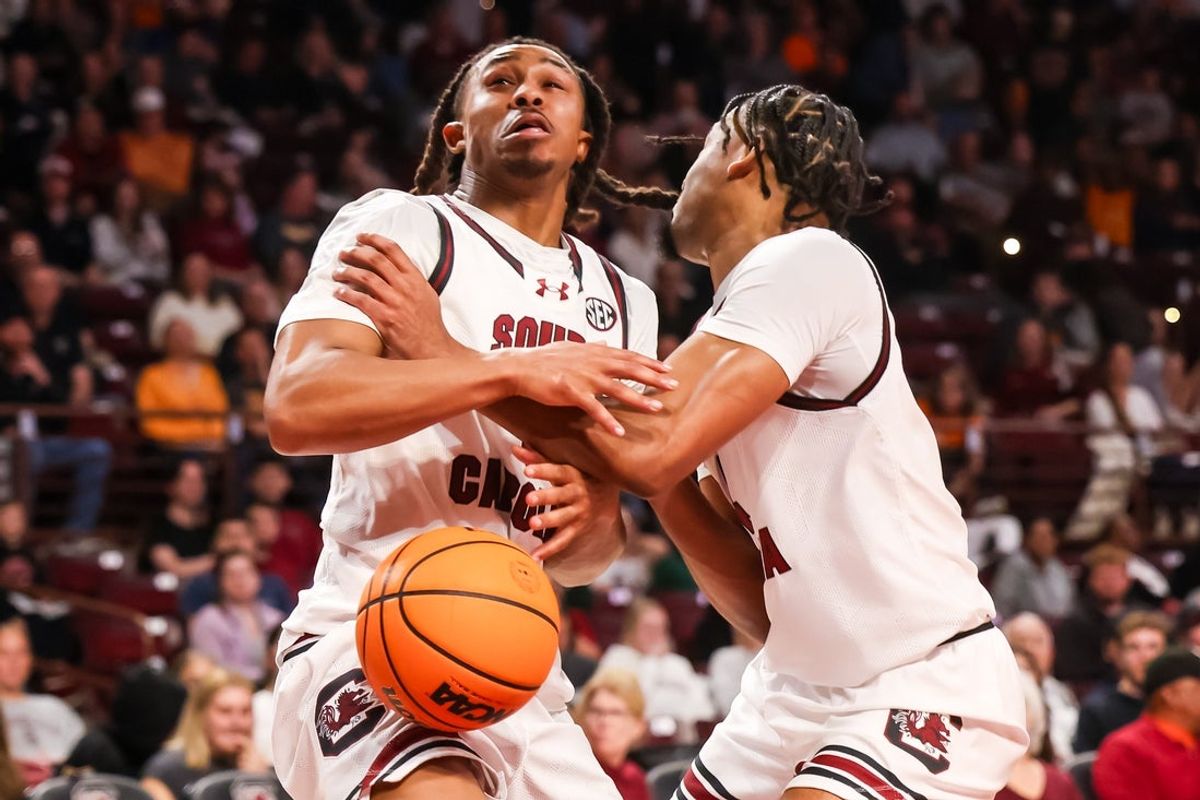 Mar 3, 2026; Columbia, South Carolina, USA; South Carolina Gamecocks guard Meechie Johnson (5) and guard Kobe Knox (4) collide while attempting to get a rebound against the Tennessee Volunteers in the first half at Colonial Life Arena. Mandatory Credit: Jeff Blake-Imagn Images